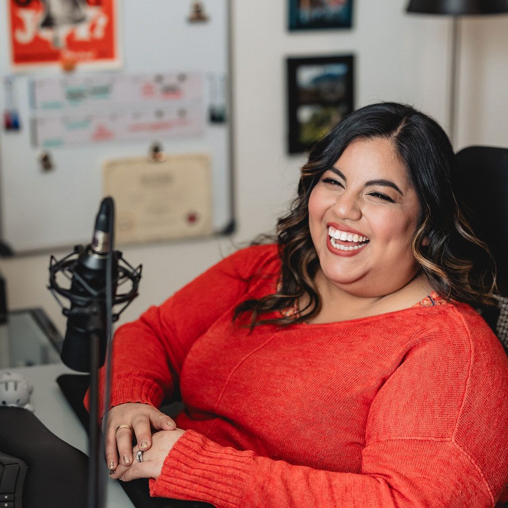 Jennifer van Alstyne sitting at her desk